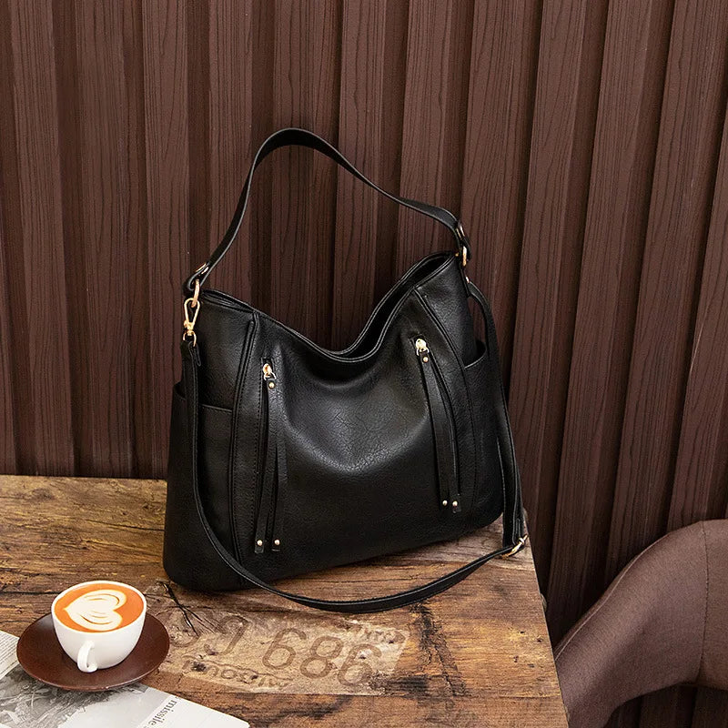 Coralie™ | Frynse Leather Bag